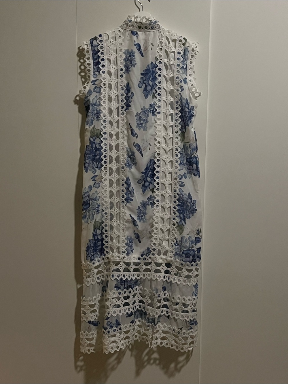 Sleeveless White Maxi Dress with Blue Floral Print and Lace Trim
